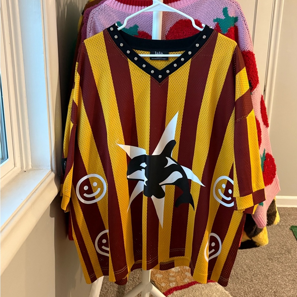 Dressed in lala orca jersey SAMPLE